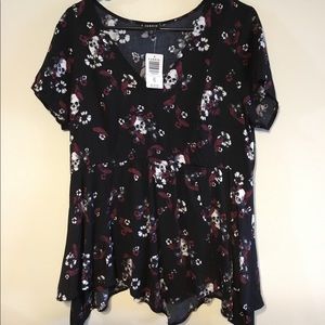 Skull blouse with handkerchief bottom.